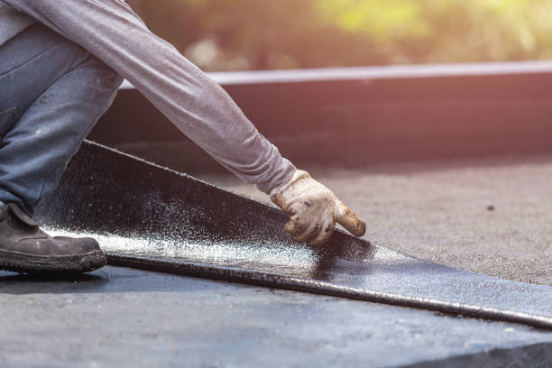 Professional Basement Waterproofing technician working in Rockford, IL